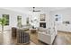 Bright and airy living room with fireplace, neutral furniture, and hardwood floors at 2607 Cameron Blvd, Isle of Palms, SC 29451