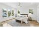 Serene main bedroom with three large windows, neutral decor, and natural light at 2607 Cameron Blvd, Isle of Palms, SC 29451