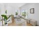 Bright sitting area with shiplap, seating, and natural light at 2607 Cameron Blvd, Isle of Palms, SC 29451