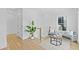 Bright upstairs sitting area featuring hardwood floors, and open stairway at 2607 Cameron Blvd, Isle of Palms, SC 29451