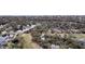 Expansive aerial view of a golf course community with homes nestled among mature trees at 263 Sea Cloud Cir, Edisto Island, SC 29438