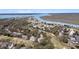 Stunning aerial view showcases the community, with river access and lush landscaping at 263 Sea Cloud Cir, Edisto Island, SC 29438