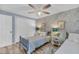Bright bedroom featuring twin beds, floral wallpaper, and a ceiling fan at 263 Sea Cloud Cir, Edisto Island, SC 29438