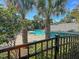 Relaxing community pool featuring lush trees and manicured shrubbery, perfect for year-round enjoyment and privacy at 263 Sea Cloud Cir, Edisto Island, SC 29438
