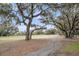 Picturesque golf course view showcasing lush green fairways, mature trees, and a tranquil setting for residents at 263 Sea Cloud Cir, Edisto Island, SC 29438