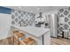 Modern kitchen featuring stainless steel appliances, white countertops, and a trendy backsplash at 263 Sea Cloud Cir, Edisto Island, SC 29438
