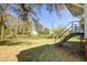 The backyard has a treeline and backs up to other homes at 2641 Woodlawn Ave, North Charleston, SC 29405