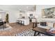 Open-concept living space with kitchen island, dining area, and comfortable seating at 268 Watersglen Dr, Summerville, SC 29486
