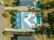 Aerial view of property showing a well-maintained home, manicured lawn, pool, and ample parking at 2722 Crooked Stick Ln, Mount Pleasant, SC 29466