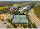 An aerial view of tennis courts, basketball court, and neighborhood homes at 2722 Crooked Stick Ln, Mount Pleasant, SC 29466