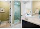 Bathroom showcasing glass shower, updated fixtures, and access to the bedroom suite at 2722 Crooked Stick Ln, Mount Pleasant, SC 29466