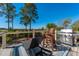 Outdoor deck features lounge chairs, grill and lovely wooded views at 2722 Crooked Stick Ln, Mount Pleasant, SC 29466