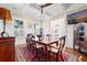 Elegant dining room with coffered ceilings, wainscoting, and a wooden table, offering a sophisticated space for gatherings at 2722 Crooked Stick Ln, Mount Pleasant, SC 29466