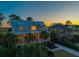 Charming two-story home features a welcoming porch and manicured landscaping at 2722 Crooked Stick Ln, Mount Pleasant, SC 29466