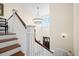 Open Foyer and staircase with pendant lighting at 2722 Crooked Stick Ln, Mount Pleasant, SC 29466