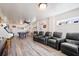 Spacious game room with arcade game, pool table, theater seats and shiplap accent wall at 2722 Crooked Stick Ln, Mount Pleasant, SC 29466