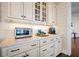 Kitchen with ample counter space, white cabinets, and under-cabinet lighting at 2722 Crooked Stick Ln, Mount Pleasant, SC 29466