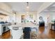 Spacious kitchen with a large island, pendant lighting, and professional-grade appliances at 2722 Crooked Stick Ln, Mount Pleasant, SC 29466
