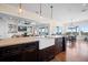 Beautiful kitchen with a large sink and island, and a seamless flow to the living room at 2722 Crooked Stick Ln, Mount Pleasant, SC 29466