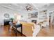 Cozy living room with coffered ceilings, fireplace, built-in shelving, and hardwood floors at 2722 Crooked Stick Ln, Mount Pleasant, SC 29466