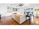 Bright living room with coffered ceiling, fireplace, built-ins, and access to a screened-in porch at 2722 Crooked Stick Ln, Mount Pleasant, SC 29466