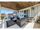 Outdoor patio with dining and seating space, plus scenic views and a wooden ceiling at 2722 Crooked Stick Ln, Mount Pleasant, SC 29466