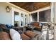 Covered patio with wicker furniture is a cozy spot for outdoor relaxation at 2722 Crooked Stick Ln, Mount Pleasant, SC 29466