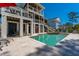 Back exterior featuring a pool, covered patio, and outdoor staircase at 2722 Crooked Stick Ln, Mount Pleasant, SC 29466