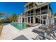 Back exterior featuring a pool, covered patio, and poolside lounge chairs at 2722 Crooked Stick Ln, Mount Pleasant, SC 29466