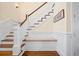 Beautiful staircase with built in bench and storage at 2722 Crooked Stick Ln, Mount Pleasant, SC 29466