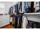 Spacious walk-in closet with ample hanging space and built-in drawers for organization at 2722 Crooked Stick Ln, Mount Pleasant, SC 29466