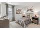 Cozy bedroom with plaid bedding, hockey decor, and a bedside table, offering a themed personal space at 280 Watersglen Dr, Summerville, SC 29486