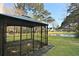 Backyard view showcasing the pond and gazebo at 3438 Farmers Market Dr, Charleston, SC 29414