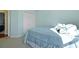 This bedroom has blue bedding and a carpeted floor at 3438 Farmers Market Dr, Charleston, SC 29414