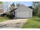 Charming single-story home with a well-manicured lawn and an attached two-car garage at 3438 Farmers Market Dr, Charleston, SC 29414