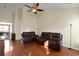 Spacious living room with wood floors and comfortable leather furniture at 3438 Farmers Market Dr, Charleston, SC 29414