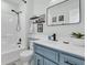 Updated bathroom with a modern vanity, plenty of storage, and a combined shower and tub at 346 Courtney Round, Summerville, SC 29483