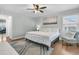 Well-lit bedroom featuring hardwood floors, neutral colors, and a comfortable queen-sized bed at 346 Courtney Round, Summerville, SC 29483