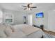 Relaxing bedroom with ceiling fan, mounted TV, ample natural light and a serene and peaceful atmosphere at 346 Courtney Round, Summerville, SC 29483