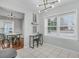 Charming breakfast nook with a view, featuring modern lighting and easy access to the dining area at 346 Courtney Round, Summerville, SC 29483