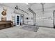 Spacious garage with ping pong table and storage racks, ideal for hobbies and organization at 346 Courtney Round, Summerville, SC 29483