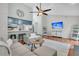 Bright living area features hardwood floors, open layout to the kitchen, and comfortable seating arrangement at 346 Courtney Round, Summerville, SC 29483
