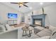 Inviting living area features a fireplace, vaulted ceilings, and seamless access to the outdoor space at 346 Courtney Round, Summerville, SC 29483