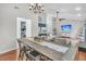 Open-concept living area blending living and dining spaces, perfect for entertaining, with hardwood floors throughout at 346 Courtney Round, Summerville, SC 29483