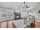 Cozy living room features a fireplace, hardwood floors, and French doors to the outdoor patio at 346 Courtney Round, Summerville, SC 29483