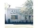 Exterior of Laura restaurant building featuring white brick and a modern design at 347 Dickerson Ln, Lincolnville, SC 29485