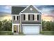 Charming two-story home with gray siding, black shutters, and a two-car garage at 347 Dickerson Ln, Lincolnville, SC 29485