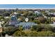 An aerial view shows a neighborhood of beach homes with a marked walking path to beach access, plus ocean views at 4006 Hartnett Blvd, Isle of Palms, SC 29451