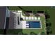 Aerial backyard featuring a pool, patio, landscaping, and staircase at 4006 Hartnett Blvd, Isle of Palms, SC 29451