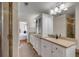 Bathroom features a double sink vanity with lots of cabinet space and a glass door shower at 4006 Hartnett Blvd, Isle of Palms, SC 29451